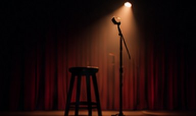 A red curtain and a stool